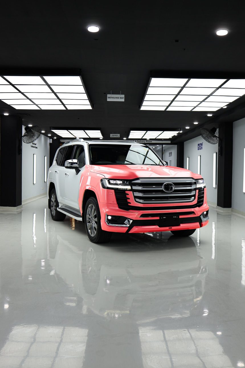 The same car with the bumpers, bonnet, front fenders and mirrors covered