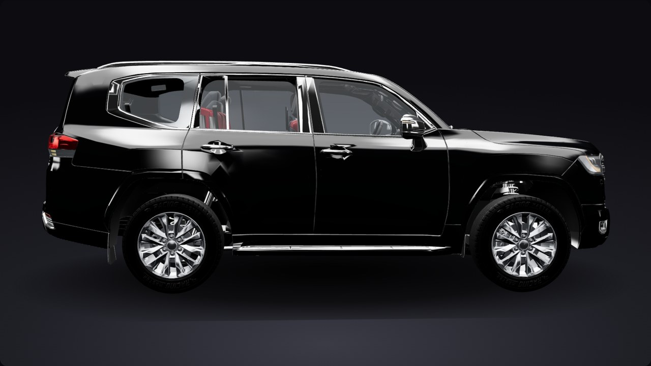 Black Land Cruiser 300 in the Detail Dungeon bay, factory glass with the cabin visible through it